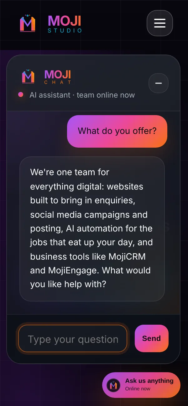 MojiChat open on the Moji Studio website on a phone, answering "What do you offer?" with websites, social media, AI automation and business tools